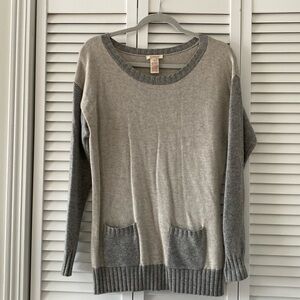 Sundance hip length patch pocket sweater.